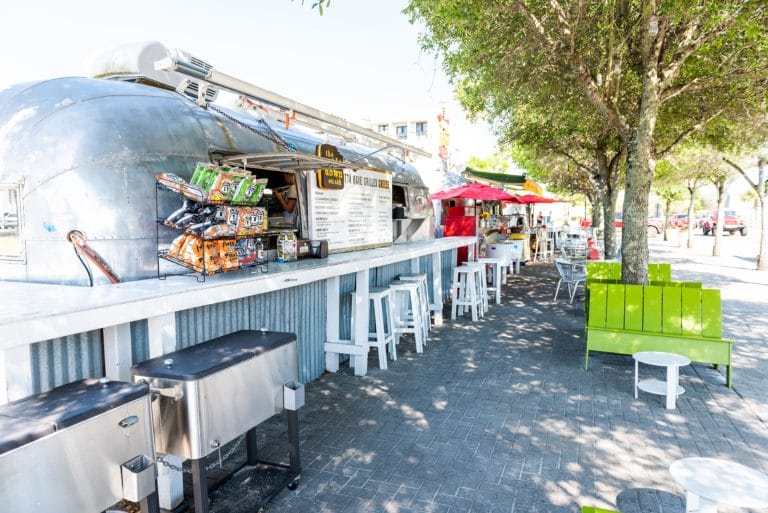 An Airstream food trailer selling snacks and food at a Florida food festival.