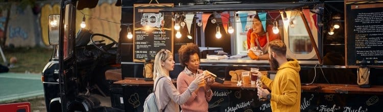 People purchasing food from a food truck