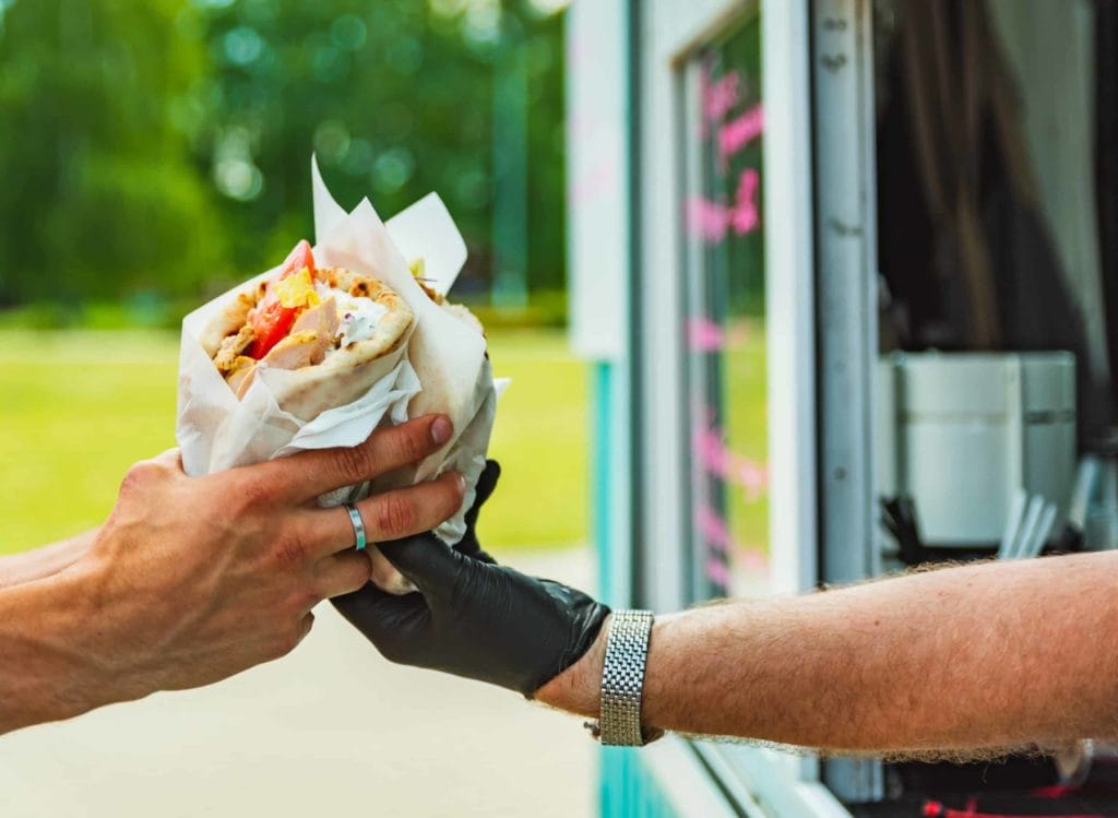 gyro being handed to customer through window