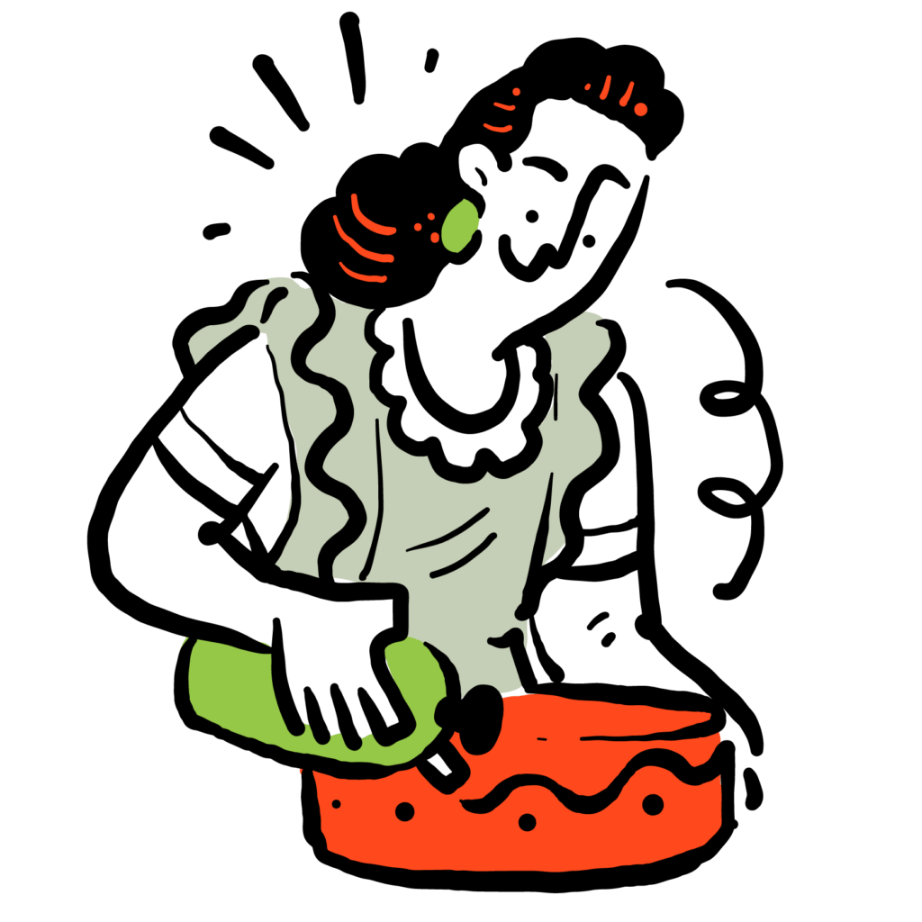 woman decorating a cake