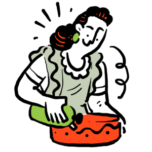 woman decorating a cake