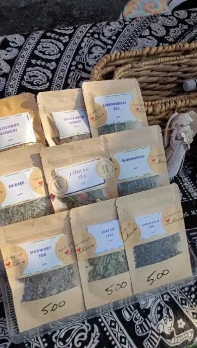 Paper bags of loose-leaf tea on the table of Mysticools Garden's booth.