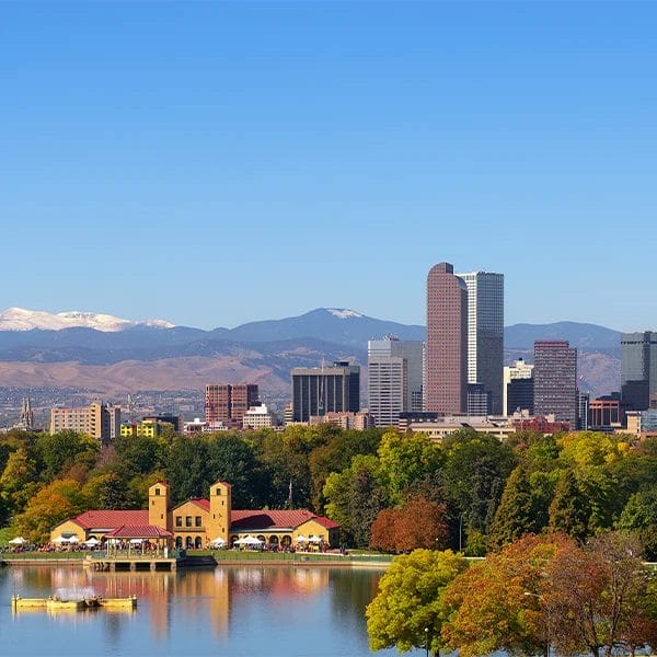 Denver, CO, nestled among the mountains.
